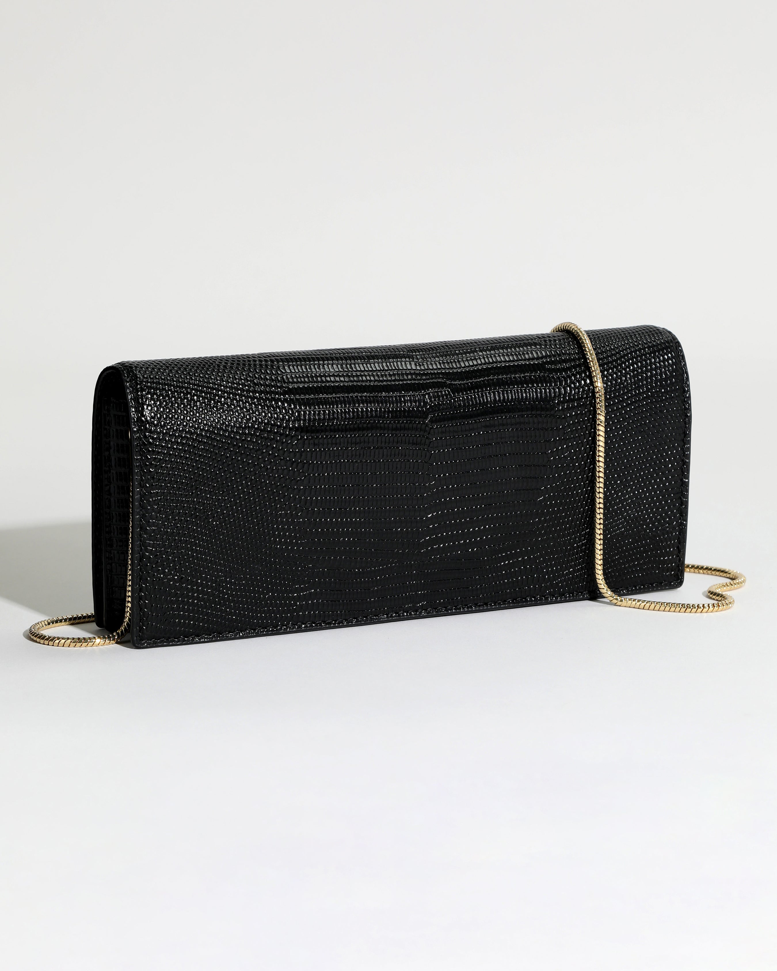Twisted Gold Black Leather Clutch – ALEXIS BITTAR