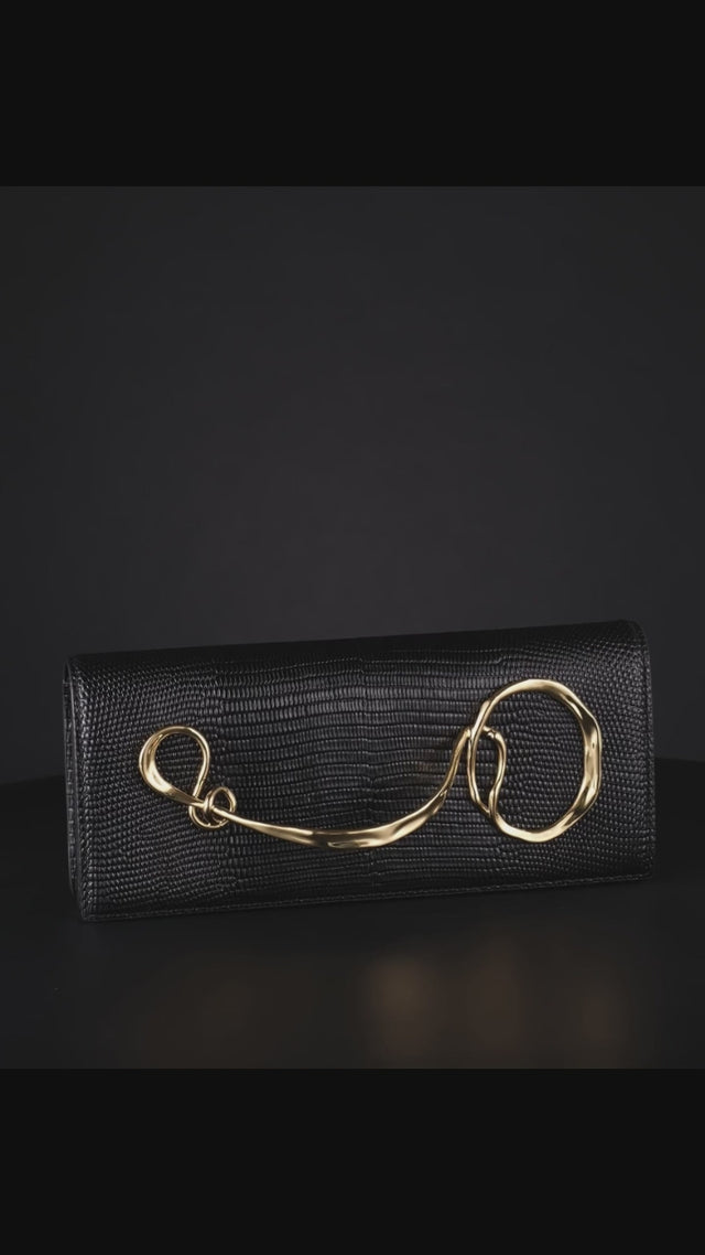 Dior Rouge holiday hot black and gold clutch